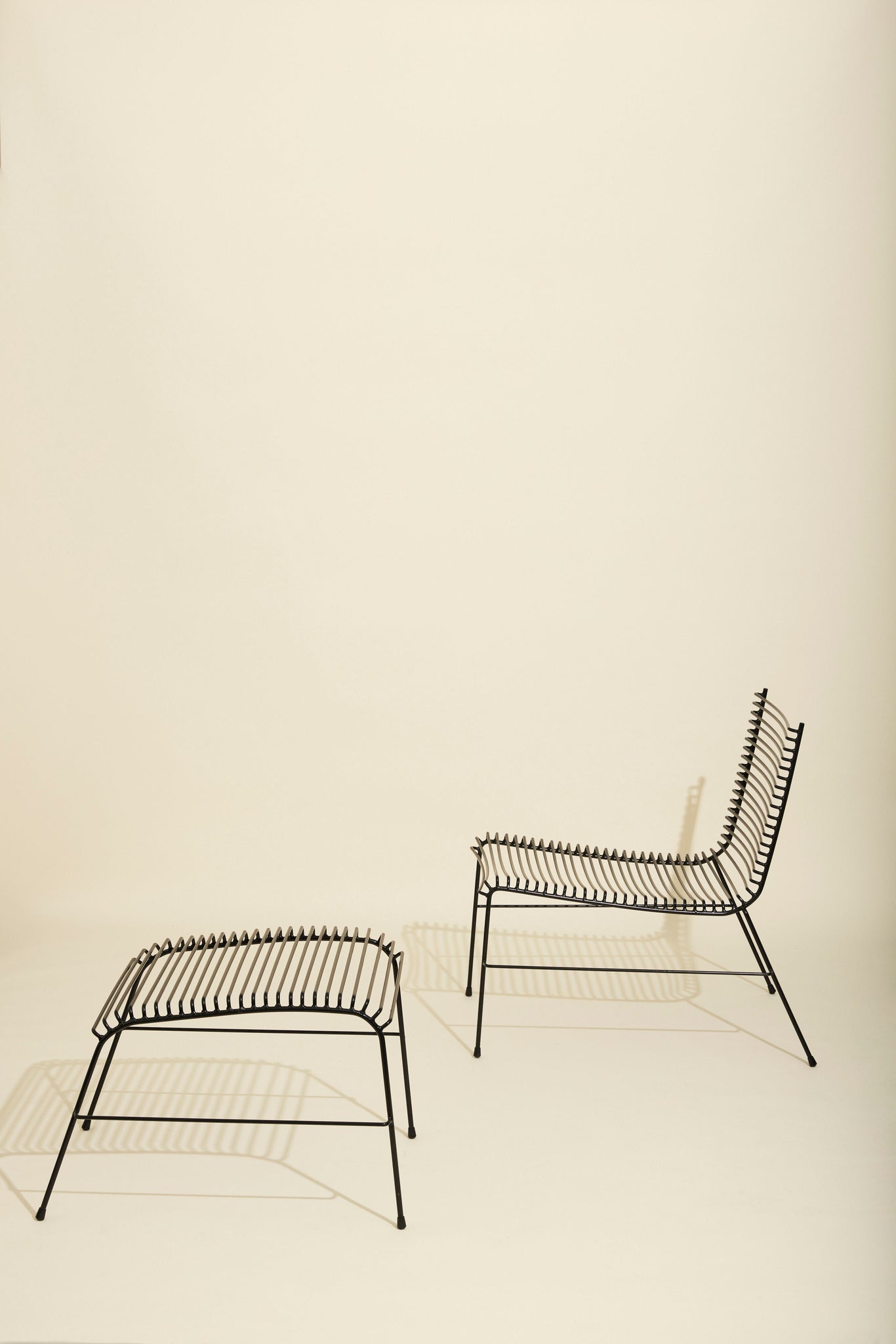 Repose-pieds String noir