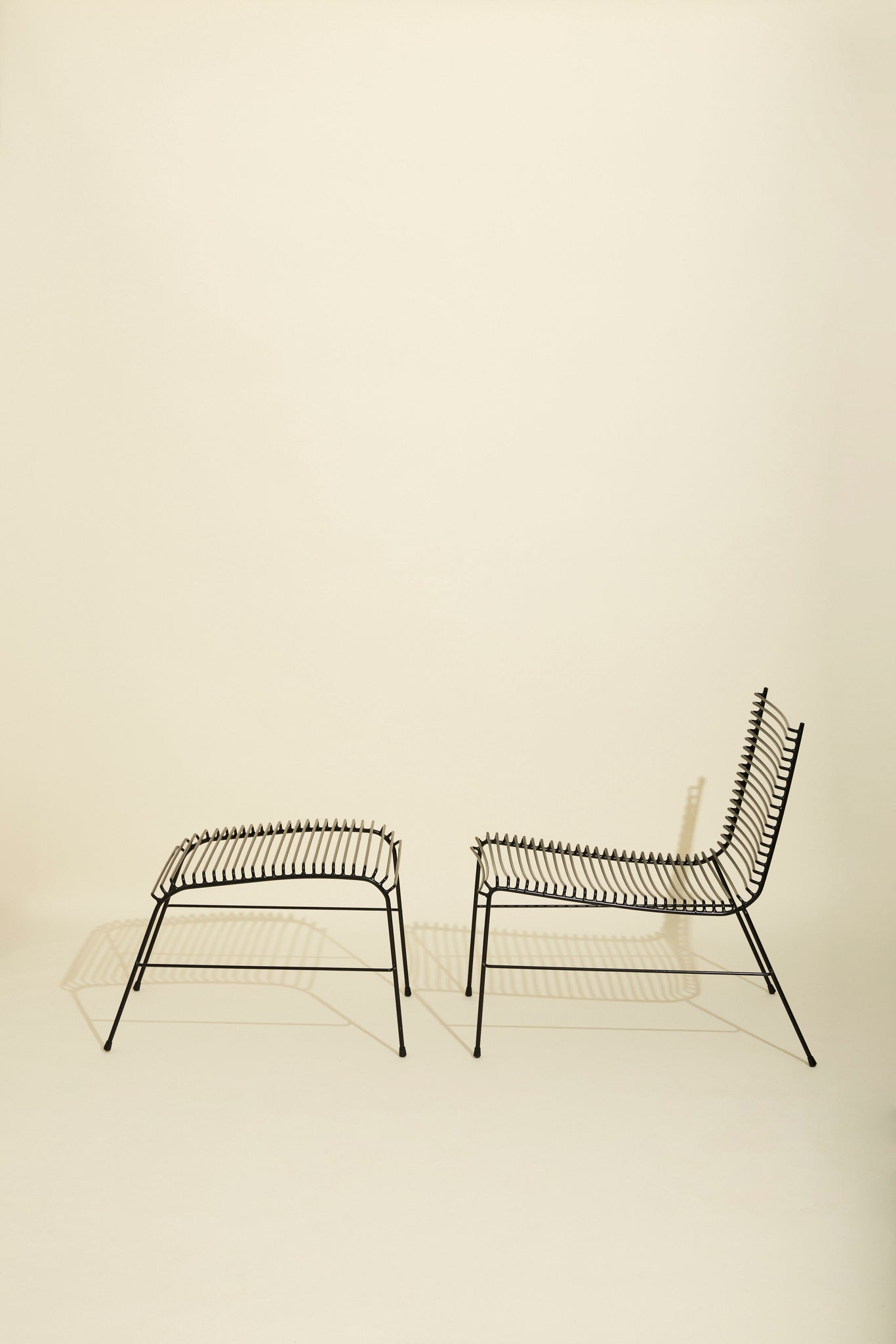 Repose-pieds String noir